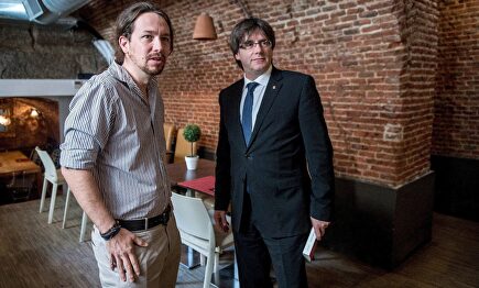 Pablo Iglesias y Carles Puigdemont | EFE