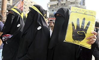 Tres mujeres musulmanas con Niqab. | EFE