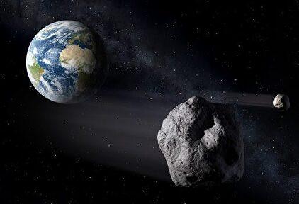Recreación de un asteroide aproximándose a la Tierra | EFE