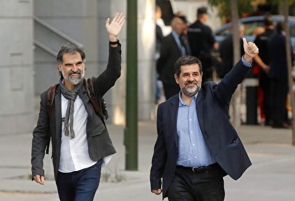 Jordi Cuixart y Jordi Sànchez, a su llegada a la Audiencia Nacional en 2017. | EFE