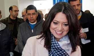 Marcela Topor vota en las elecciones del 21 de diciembre de 2017. | EFE