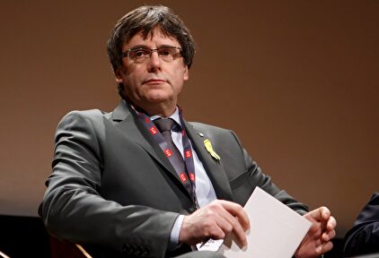 Carles Puigdemont, durante un debate en Ginebra | EFE