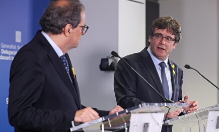 El presidente catalán Quim Torra, con el expresidente Carles Puigdemont | EFE