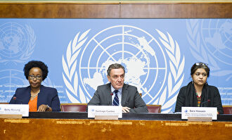 Los tres responsables del informe. | ONU