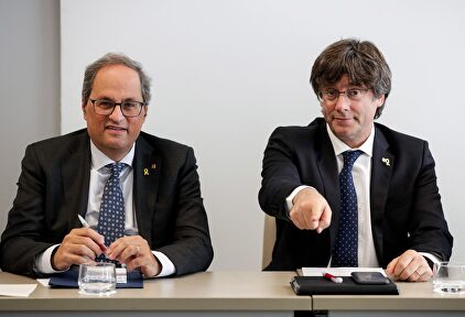El expresidente catalán, Carles Puigdemont, junto a Torra en Bruselas | EFE