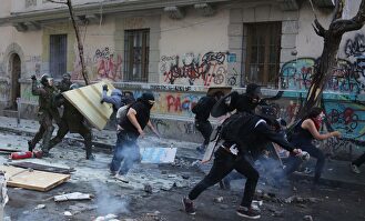 Protestas y enfrentamientos en Santiago de Chile | EFE