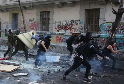 Protestas y enfrentamientos en Santiago de Chile | EFE