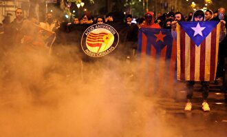 Tsunami durante los disturbios de anoche. | EFE