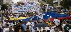 Cientos de trabajadores y estudiantes marcharon en Caracas contra Chávez. | EFE
