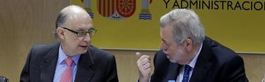 Cristbal Montoro y Antonio Beteta durante el Consejo de Poltica Fiscal. |Efe