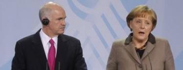 El primer ministro griego, Georgios Papandreu, y la canciller germana. Angela Merkel | Archivo