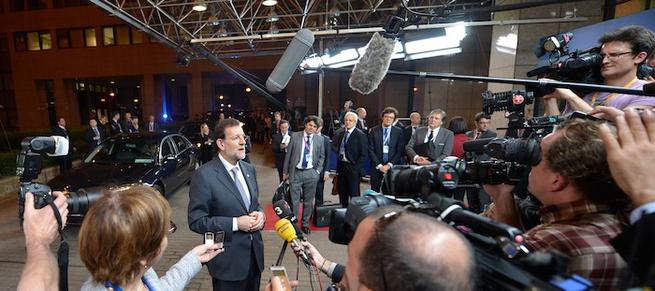 Rajoy, tras participar a la cumbre de Bruselas, insiste en mandar un mensaje a Draghi.