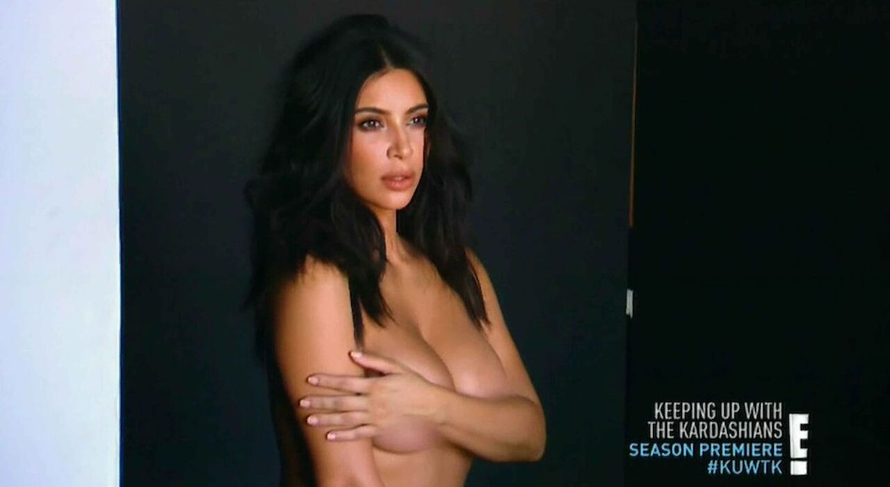 Kim kardashian displays her taut midriff and hourglass curves as she models her new skims shapewear