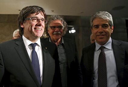 Puigdemont, Tardá y Homs, en un acto público | EFE