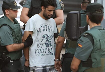 Uno de los detenidos a su llegada a la Audiencia Nacional. | EFE