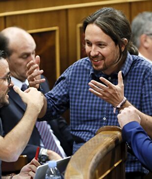 Los comunistas Alberto Garzón y Pablo Iglesias y el separatista Gabriel Rufián | EFE