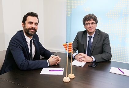 Torrent junto a Puidemont. | EFE