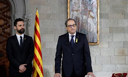 Roger Torrent, a la izquierda de Quim Torra. |  EFE