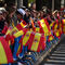 Gran éxito de público que acudió a ver el desfile portando miles de banderas de España de todos los tamaños.