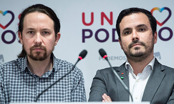 Pablo Iglesias (izq.) y Alberto Garzón | EFE