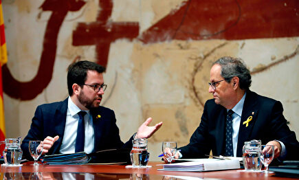El presidente catalán, Quim Torra, junto al vicepresidente autonómico, Pere Aragonès |  EFE