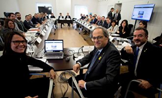 Quim Torra, Alfred Bosch y Laura Foraster, durante la reunión del DIPLOCAT |  EFE