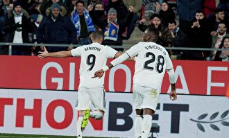 Benzema y Vinicius celebran el gol en Gerona | EFE