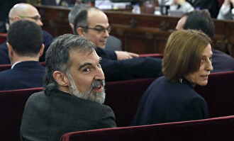 Jordi Cuixart y Carme Forcadell durante el juicio. |  EFE