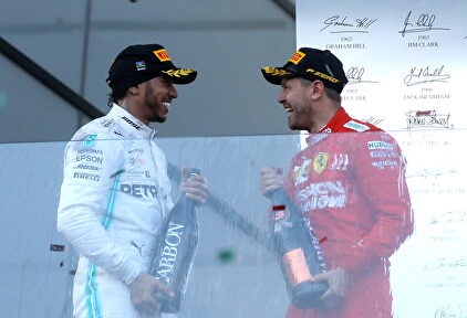 Lewis Hamilton y Sebastian Vettel | EFE