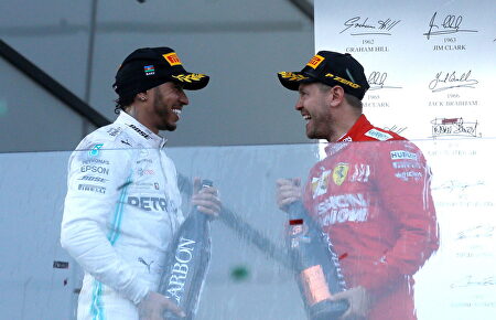 Lewis Hamilton y Sebastian Vettel | EFE