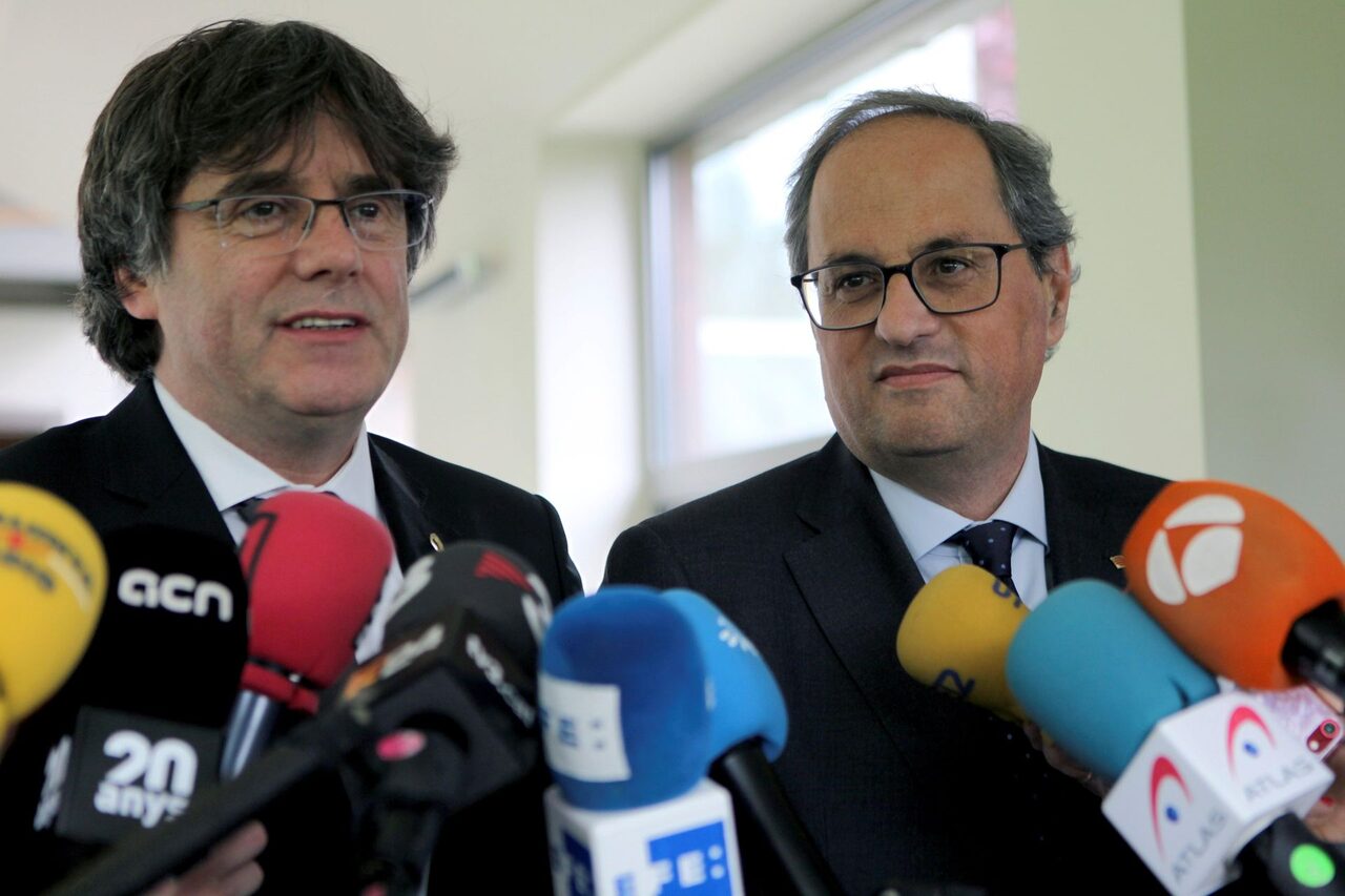 Carles Puigdemont y Quim Torra. |  EFE