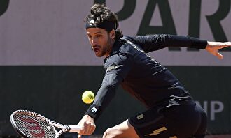 Feliciano López (37 años), durante su partido de primera ronda ante Ivo Karlovic. |  EFE