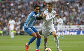 Recio y Cristiano durante un Real Madrid-Málaga. |  Cordon Press