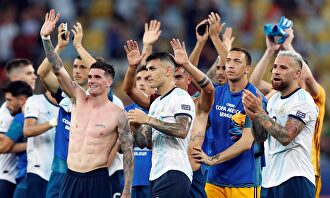 Los jugadores de Argentina celebran la victoria ante Venezuela. |  EFE