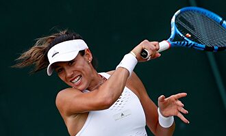 Garbiñe quiere cambiar y para ello rompe con su entrenador. |  EFE