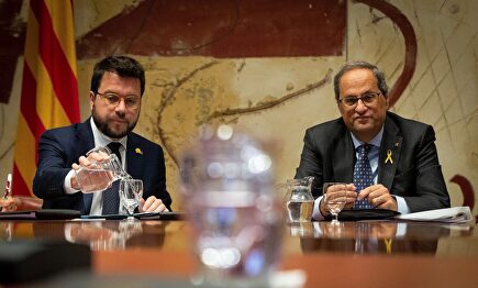 Toni Comín, a lzquierda de Torra I EFE