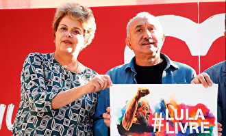 Álvarez, durante el acto con la brasileña Dilma Rousseff. |  EFE