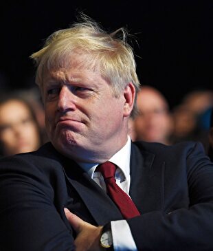 El primer ministro británico, Boris Johnson, el pasado lunes, en el congreso anual del Partido Conservador, en Manchester. |  EFE