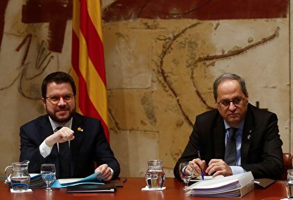 El presidente de la Generalidad, Quim Torra, acompañado por el vicepresidente, Pere Aragonés. | EFE