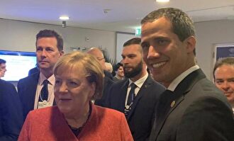 Guaidó con Merkel este jueves. |  Twitter