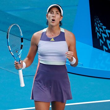 Garbiñe Muguruza celebra su victoria ante Simona Halep. |  EFE