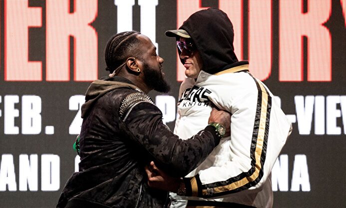 Deontay Wilder y Tyson Fury, a empujones en la rueda de prensa previa al combate