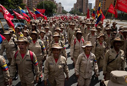 Milicianos durante una manifestación de chavismo. |  EFE