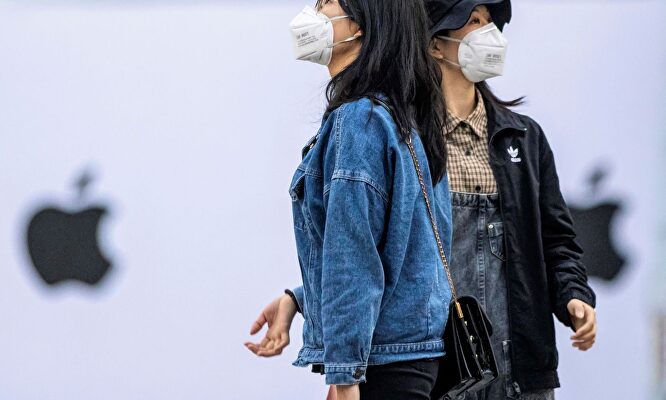 Mujeres chinas con mascarilla por el coronavirus |  EFE