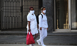 Dos enfermeras con mascarilla en La Habana | Europa Press