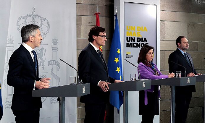 Fernando Grande-Marlaska, Salvador Illa, Margarita Robles y José Luis Ábalos, durante la rueda de prensa de este domingo. | EFE