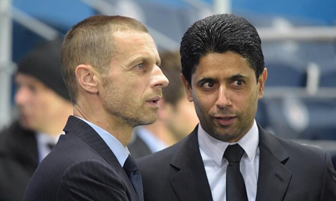 El presidente de la UEFA, Aleksander Ceferin, junto al del PSG, Nasser Al Khelaifi. | EFE/Archivo