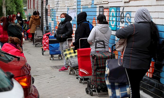 Colas del hambre. | Efe