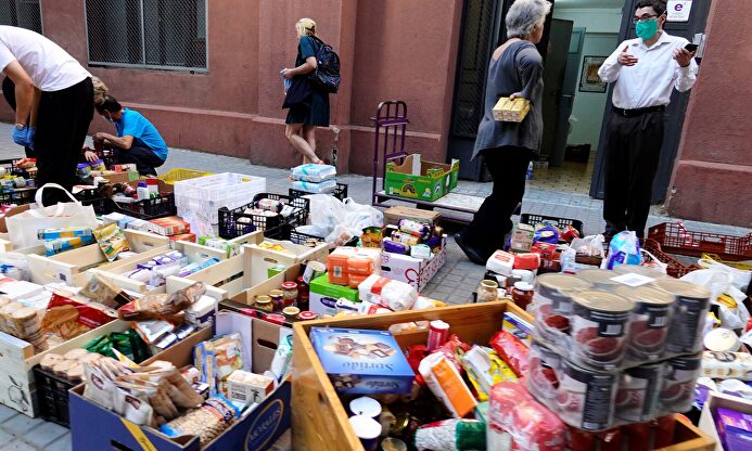 Reparto de comida | EFE