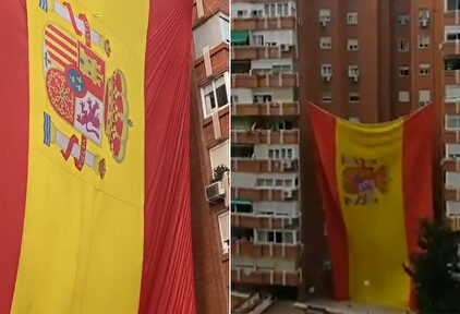 Vecinos de Madrid izan una bandera de España gigante en su edificio